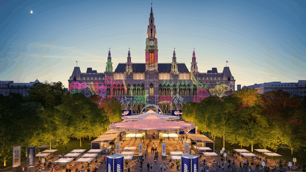 Beleuchtetes Wiener Rathaus mit dem ESC Village